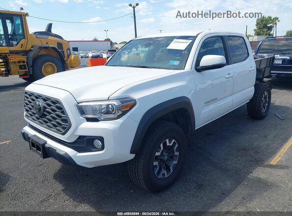 3TMCZ5AN2PM575623 2023 TOYOTA TACOMA White Vista tres cuartos delantera izquierda
