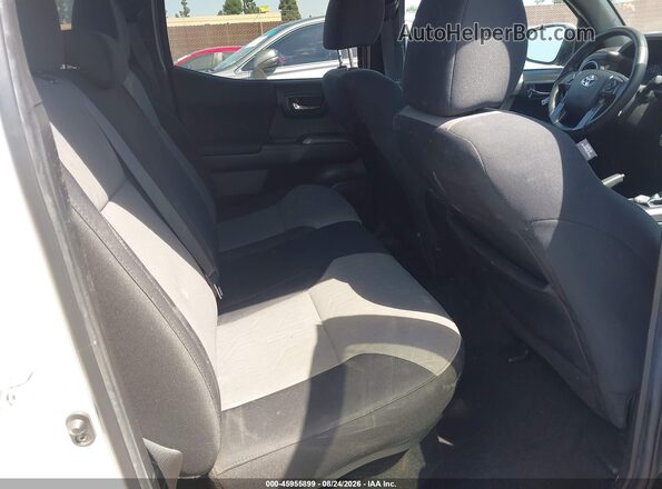 3TMCZ5AN2PM575623 2023 TOYOTA TACOMA White Vista de la etiqueta del VIN