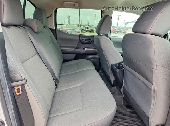 3TMCZ5AN2PM584547 2023 TOYOTA TACOMA White Rear seats view