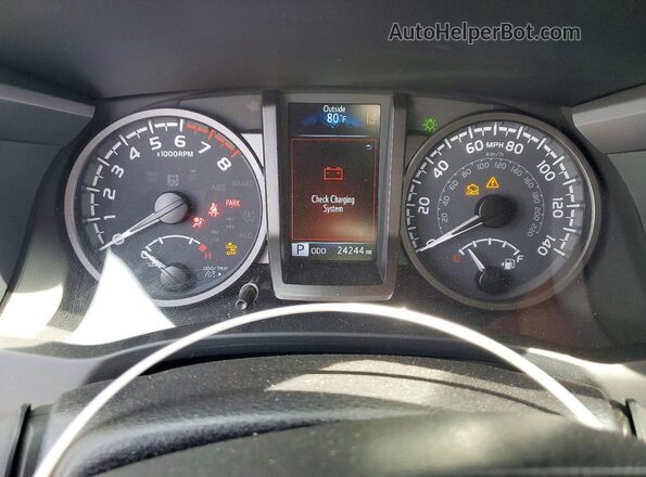 3TMCZ5AN2PM605400 2023 TOYOTA TACOMA Black Սարքավորումների վահանակի տեսք