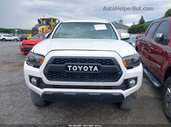 3TMCZ5AN3HM091560 2017 TOYOTA TACOMA White Սալոնի հետևի տեսք