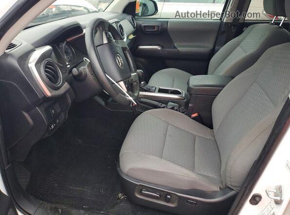3TMCZ5AN3PM547894 2023 TOYOTA TACOMA Белый Вид салона спереди