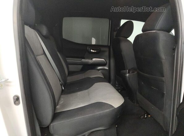 3TMCZ5AN3PM609035 2023 TOYOTA TACOMA White Rear seats view