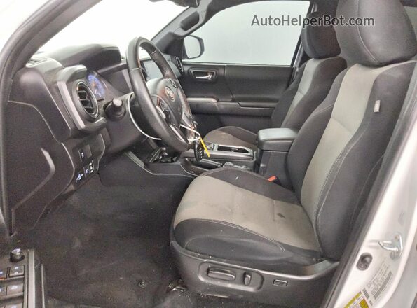 3TMCZ5AN3PM609035 2023 TOYOTA TACOMA White Front interior view