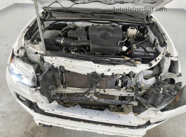 3TMCZ5AN3PM609035 2023 TOYOTA TACOMA White Rear interior view