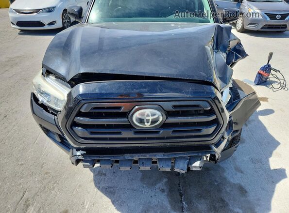 3TMCZ5AN4KM194221 2019 TOYOTA TACOMA Black Widok wnętrza z tyłu