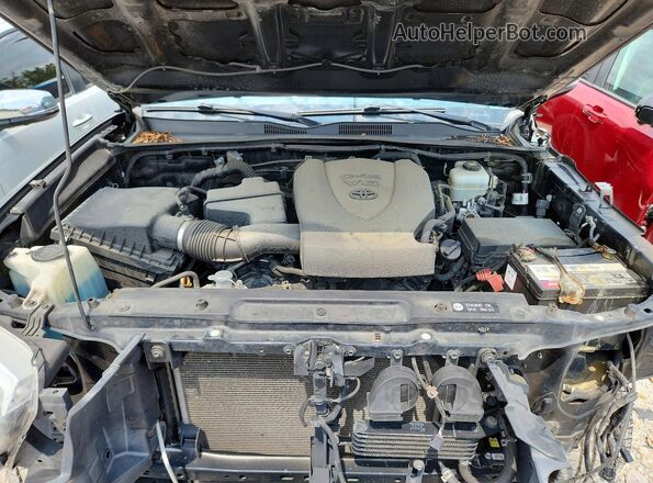 3TMCZ5AN4KM229758 2019 TOYOTA TACOMA Черный Вид задней части салона