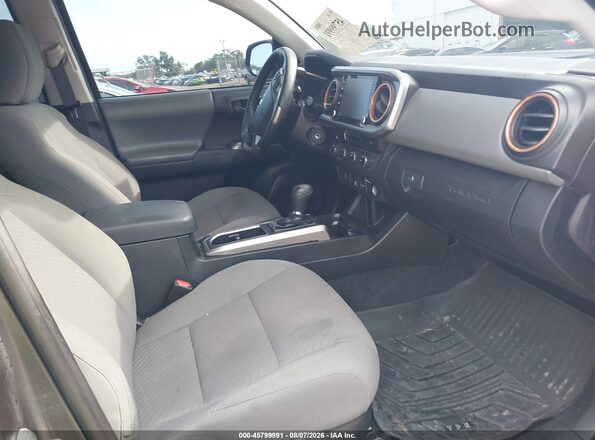 3TMCZ5AN5MM372107 2021 TOYOTA TACOMA Gray Vista interior delantera