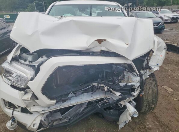 3TMCZ5AN5PM623602 2023 TOYOTA TACOMA White Vista interior trasera