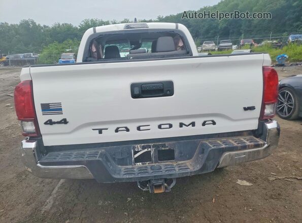 3TMCZ5AN5PM623602 2023 TOYOTA TACOMA White Vista trasera