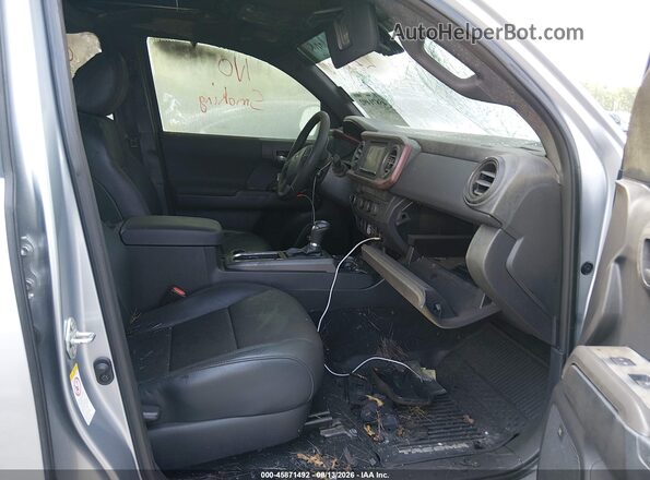 3TMCZ5AN6KM203629 2019 TOYOTA TACOMA Серебряный Вид салона спереди