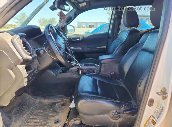 3TMCZ5AN6KM244696 2019 TOYOTA TACOMA White Front interior view