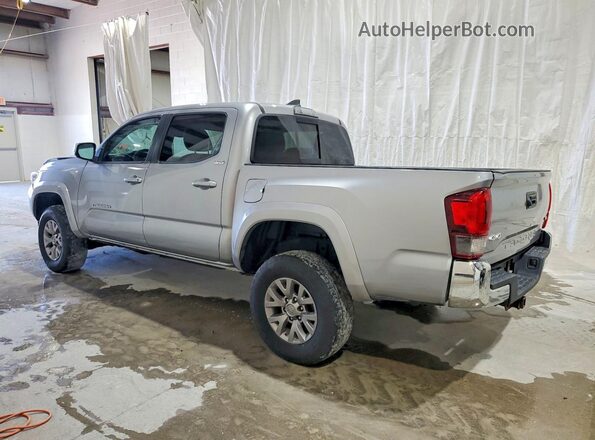 3TMCZ5AN6KM282168 2019 TOYOTA TACOMA Silver Rear left