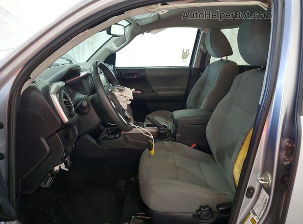 3TMCZ5AN6KM282168 2019 TOYOTA TACOMA Silver Front interior view