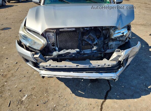3TMCZ5AN7KM195685 2019 TOYOTA TACOMA Silver Вид задньої частини салону