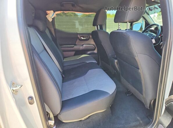 3TMCZ5AN7PM646167 2023 TOYOTA TACOMA Белый Вид задних сидений