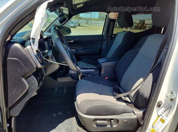 3TMCZ5AN7PM646167 2023 TOYOTA TACOMA Белый Вид салона спереди