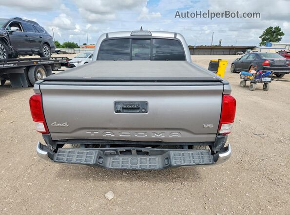 3TMCZ5AN8HM084992 2017 TOYOTA TACOMA Silver Вид ззаду