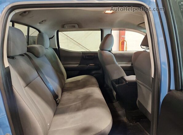 3TMCZ5AN8KM203731 2019 TOYOTA TACOMA Blue Rear seats view