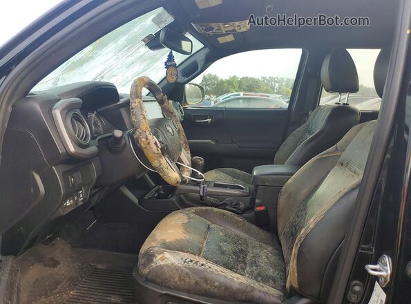 3TMCZ5AN8MM447057 2021 TOYOTA TACOMA Black Front interior view