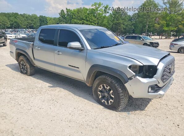 3TMCZ5AN8PM610293 2023 TOYOTA TACOMA Silver Front right