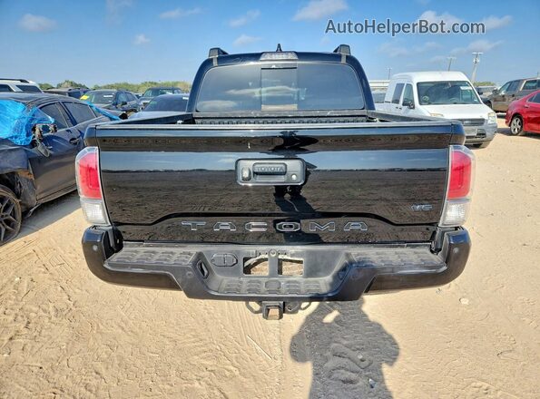 3TMCZ5AN9PM587459 2023 TOYOTA TACOMA Черный Вид салона спереди
