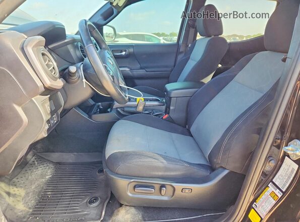 3TMCZ5AN9PM587459 2023 TOYOTA TACOMA Черный Вид панели приборов