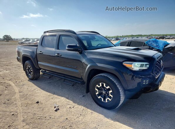 3TMCZ5AN9PM587459 2023 TOYOTA TACOMA Черный Вид спереди
