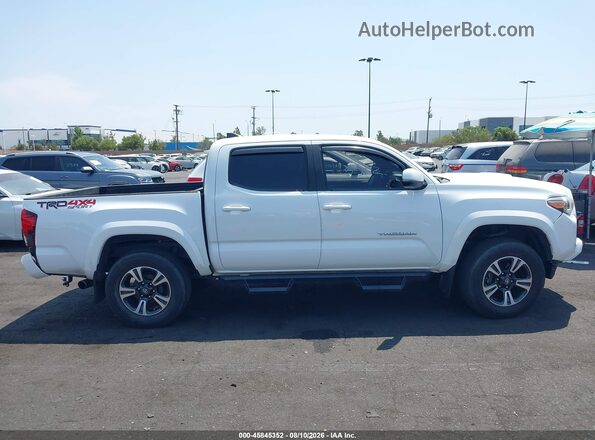 3TMCZ5ANXJM173274 2018 TOYOTA TACOMA White Вид задньої частини салону