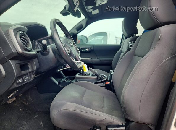 3TMDZ5BN4KM064880 2019 TOYOTA TACOMA White წინა სალონის ხედი