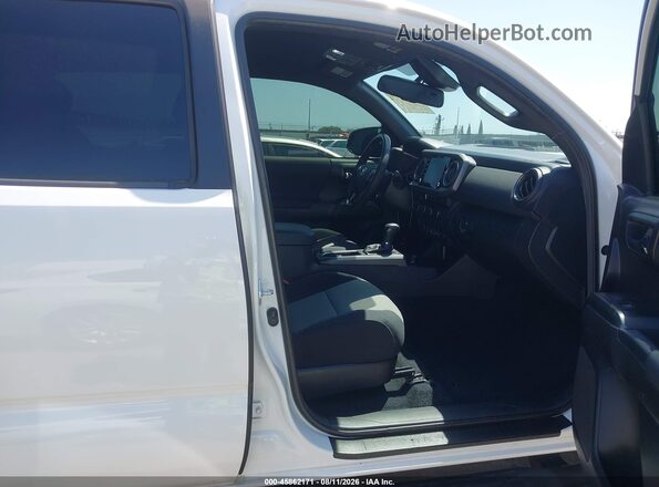 3TMDZ5BN5PM142705 2023 TOYOTA TACOMA White Widok wnętrza z przodu