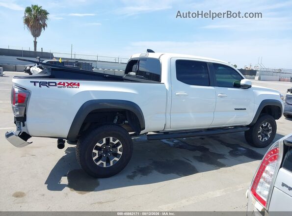 3TMDZ5BN5PM142705 2023 TOYOTA TACOMA White Widok wnętrza z tyłu