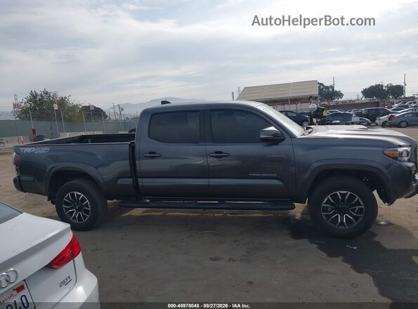3TMDZ5BN5PM144065 2023 TOYOTA TACOMA Gray Rear interior view