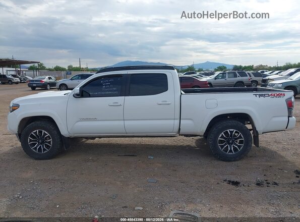 3TMDZ5BNXPM143493 2023 TOYOTA TACOMA White Вид задньої частини салону