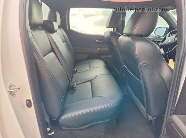 3TMDZ5BNXPM151075 2023 TOYOTA TACOMA White Rear seats view