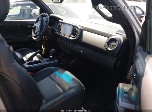 3TMDZ5BNXPM164246 2023 TOYOTA TACOMA Silver Vista interior delantera