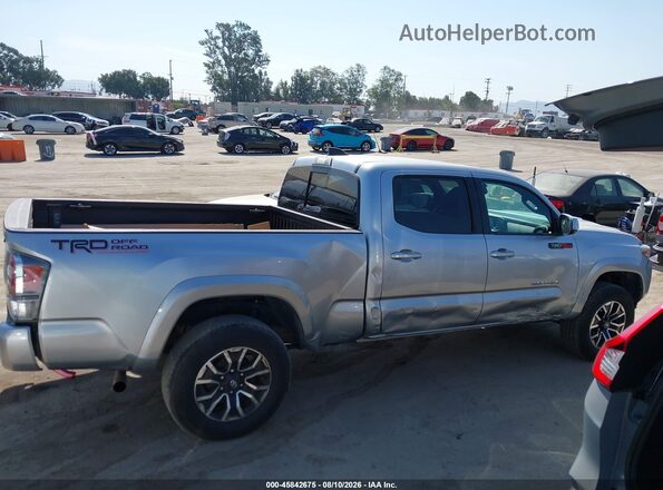 3TMDZ5BNXPM164246 2023 TOYOTA TACOMA Silver Vista interior trasera