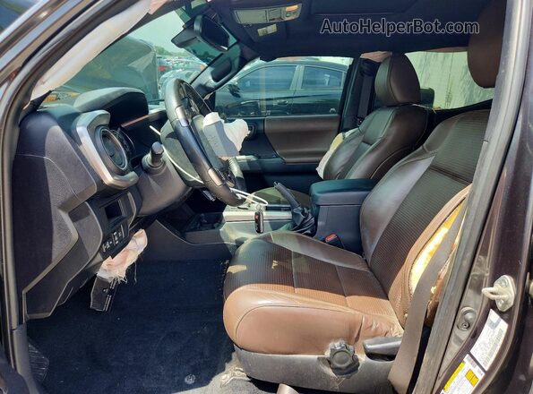 3TMGZ5AN2JM178891 2018 TOYOTA TACOMA Gray Vista interior delantera