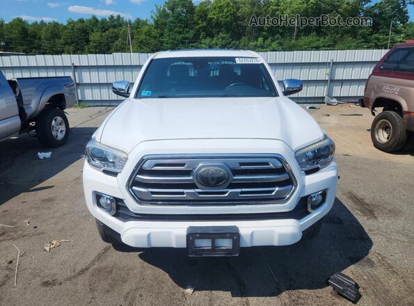 3TMGZ5AN3JM138481 2018 TOYOTA TACOMA White Դիմացի տեսք
