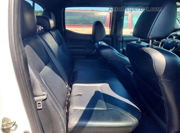 3TMGZ5AN3JM138481 2018 TOYOTA TACOMA White Հետևի նստատեղերի տեսք