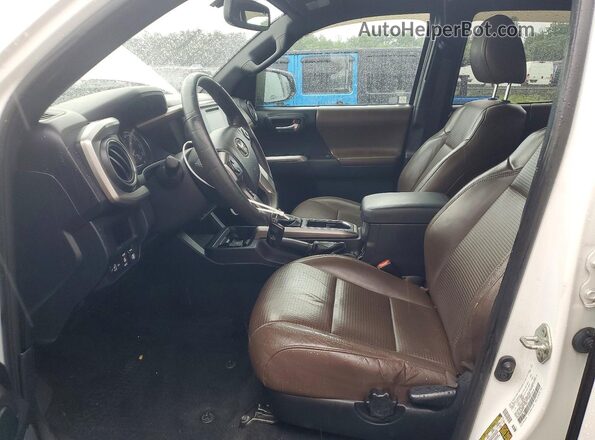 3TMGZ5AN4HM055751 2017 TOYOTA TACOMA White Вид салону спереду
