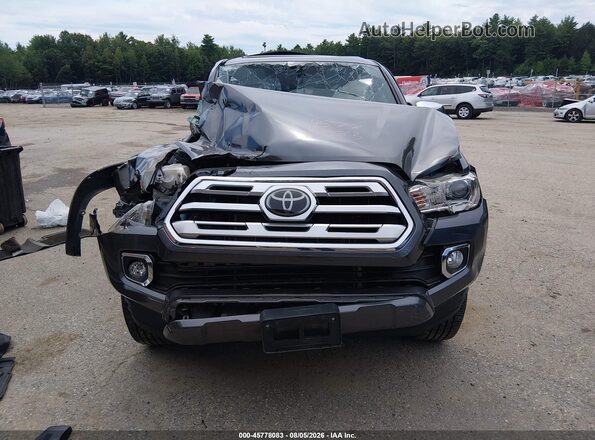 3TMGZ5AN8JM154529 2018 TOYOTA TACOMA Gray Widok wnętrza z tyłu