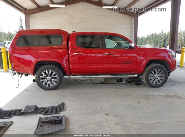 3TMGZ5AN8PM574753 2023 TOYOTA TACOMA Red Rear interior view