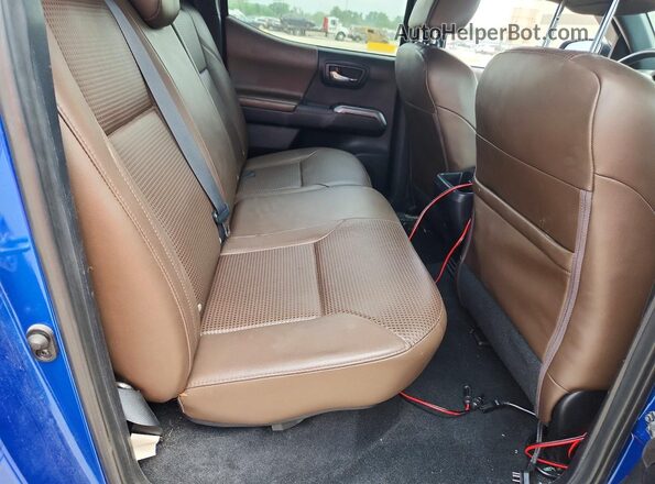 3TMGZ5ANXHM095915 2017 TOYOTA TACOMA Blue Vista de los asientos traseros