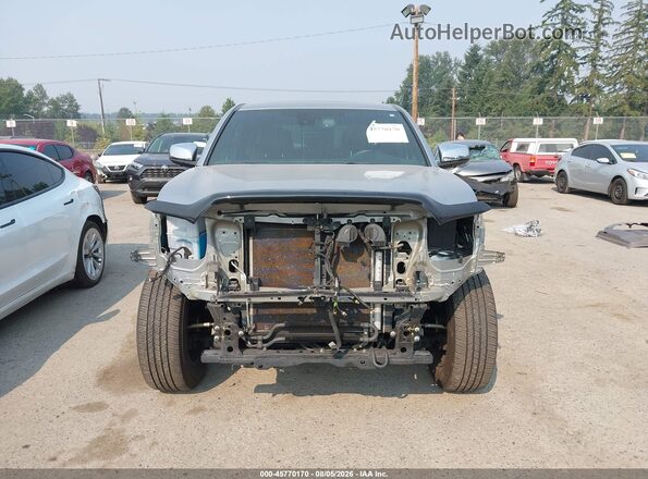 3TMHZ5BN2PM149340 2023 TOYOTA TACOMA Silver Rear interior view