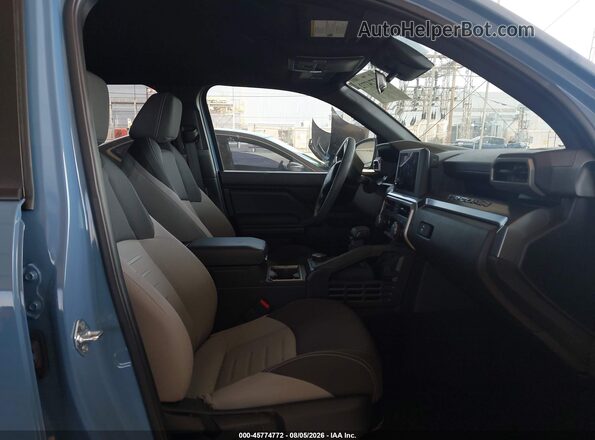 3TMKB5FN3TM057698 2026 TOYOTA TACOMA Blue Widok wnętrza z przodu