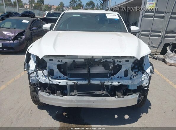 3TMKB5FN4SM040276 2025 TOYOTA TACOMA White Вид задньої частини салону