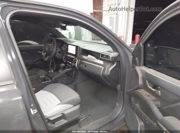 3TMLB5JN5TM295676 2026 TOYOTA TACOMA Серый Вид салона спереди