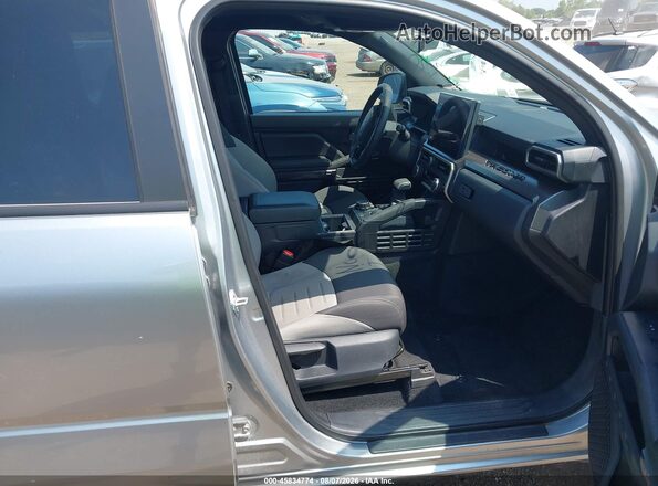 3TMLB5JN6SM105656 2025 TOYOTA TACOMA Silver Front interior view