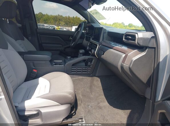 3TMLB5JN6SM112669 2025 TOYOTA TACOMA Серебряный Вид салона спереди